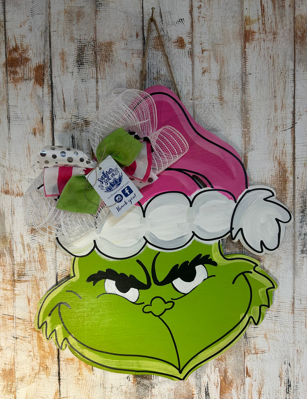 Christmas “monster” with pink Santa hat, door hanger