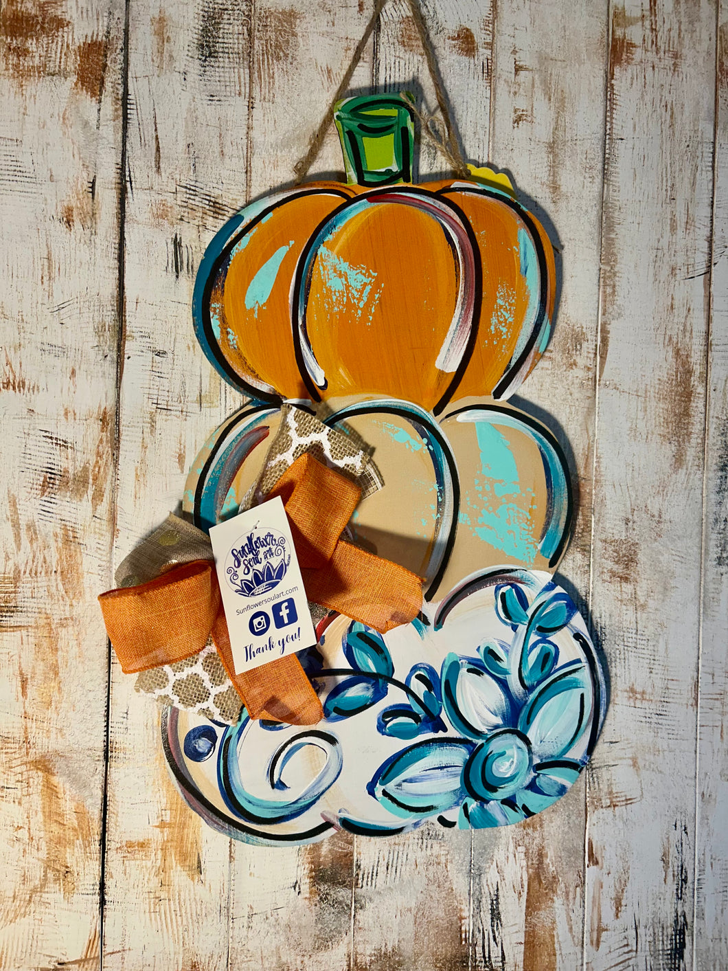 Stacked pumpkin door hanger, 20”, with blue and white pumpkin and teal accents.