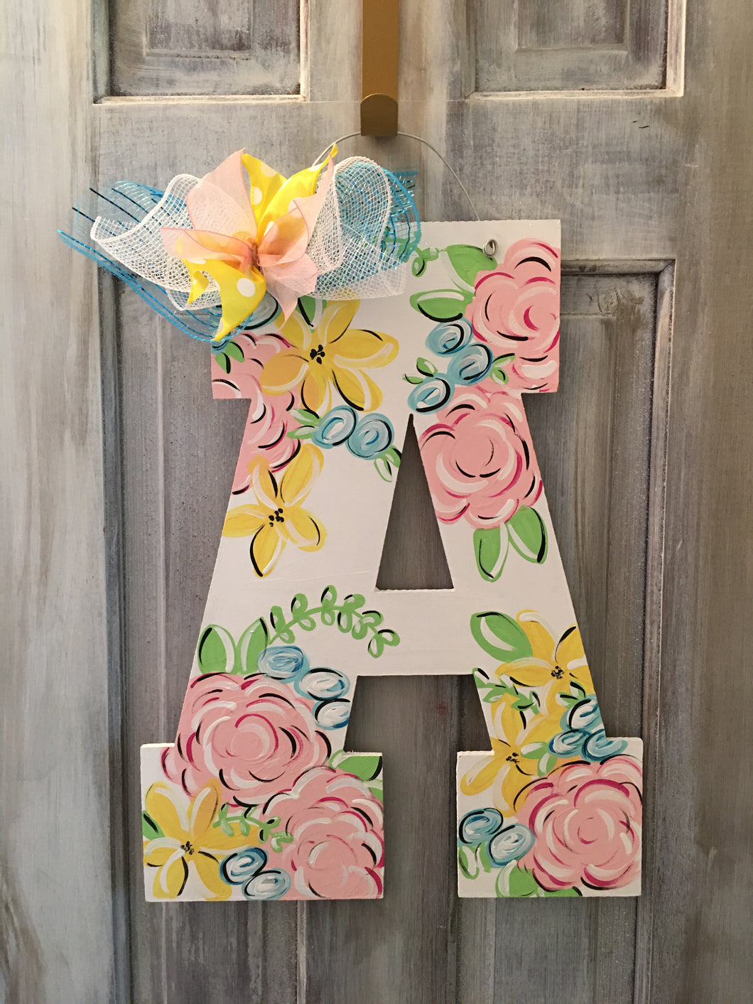 Pastel flowers single letter door hanger